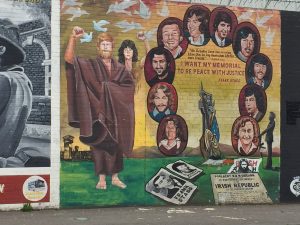 The republican prisoners commemorated in this mural sought prisoner of war status. Rather than wear prison garb, they opted for blankets; their action became known as "the blanket protest." The prisoners also initiated a hunger strike. Some died before the protest ended.